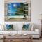 Designart - Window Open to Beach with Palm - Seashore Print on Natural Pine Wood